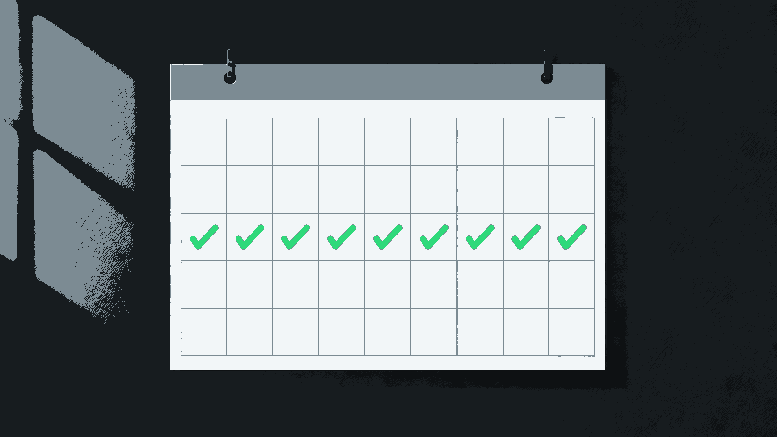 A blank wall calendar shows a row of green check marks in morning light.