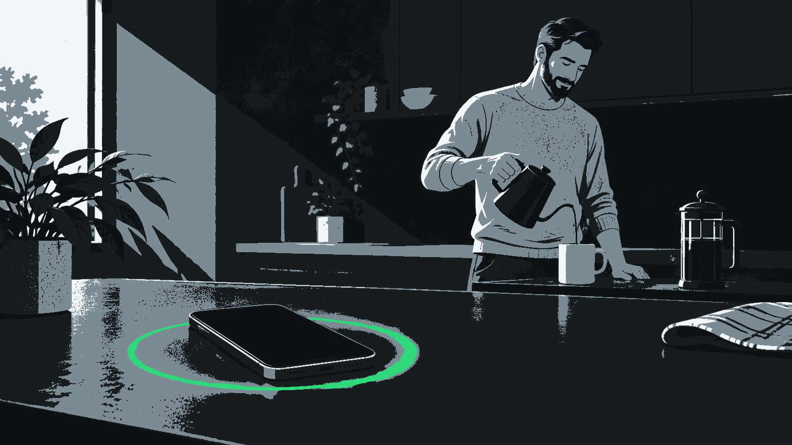 A phone with a soft green ring rests on a kitchen counter while a man makes coffee.