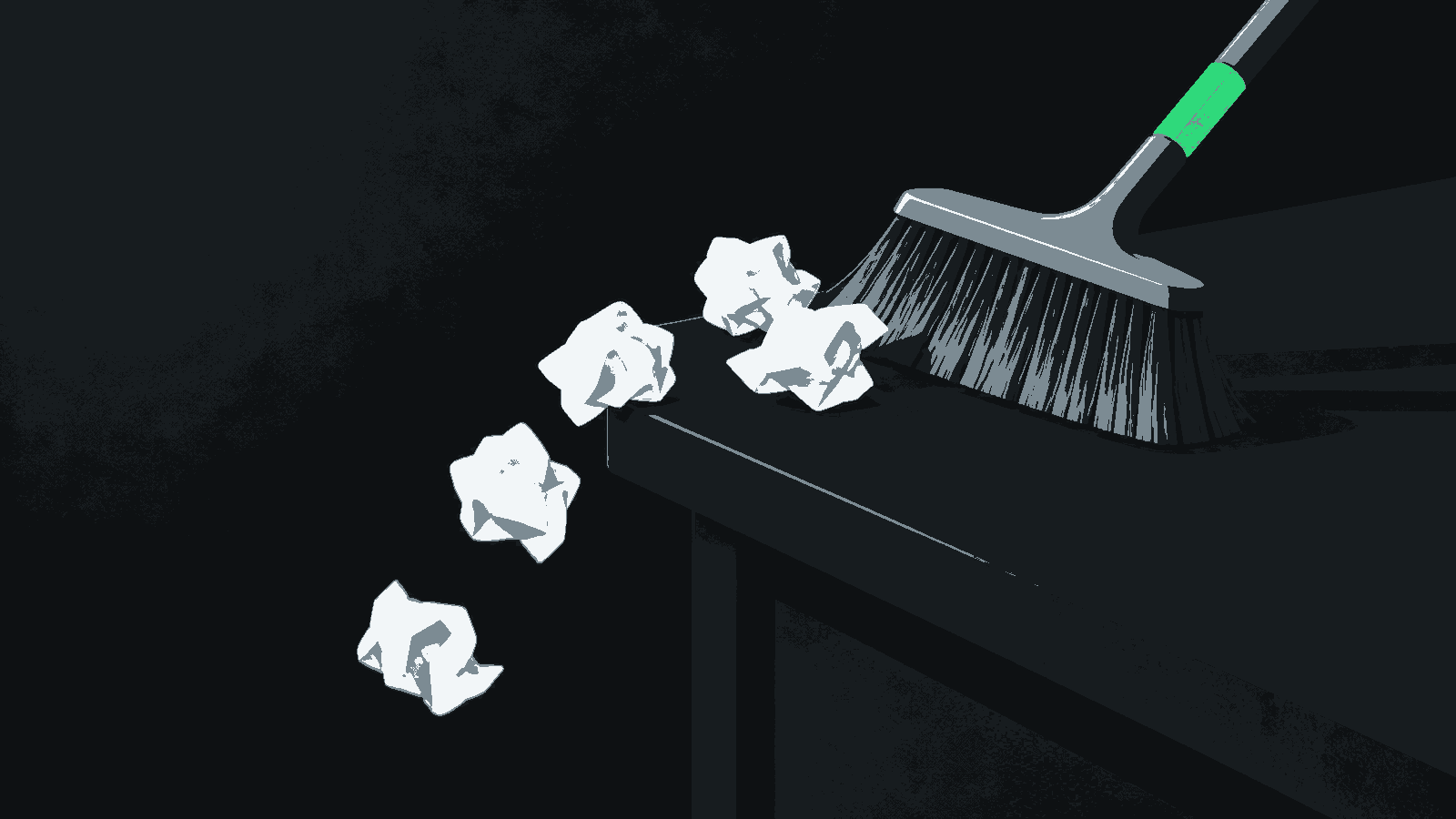A hand brush sweeps crumpled blank notes from a dark desk.