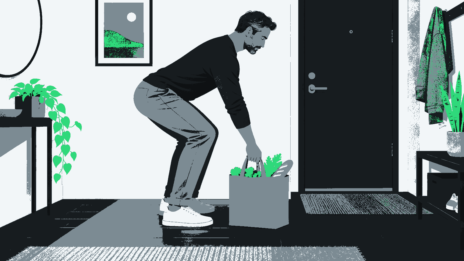 A fully clothed man bends at the hips with bent knees and a straight back, one hand on a grocery bag on the floor of a bright entryway.